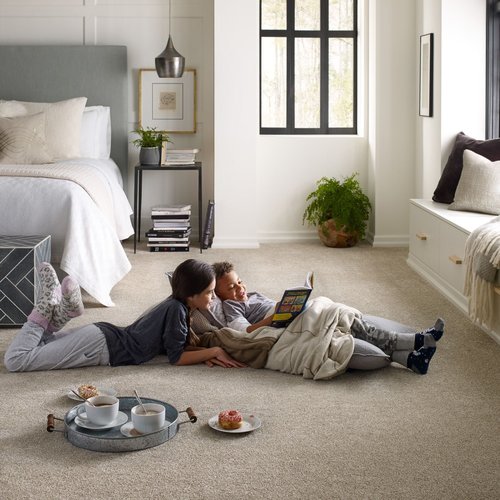 kids reading on soft brown carpet from Carter Carpets & Vinyl in Temperance, MI